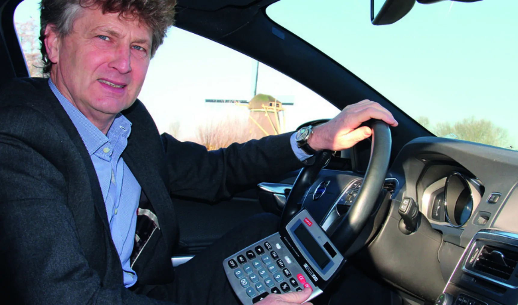 Wilfred Mooij in auto aangepast